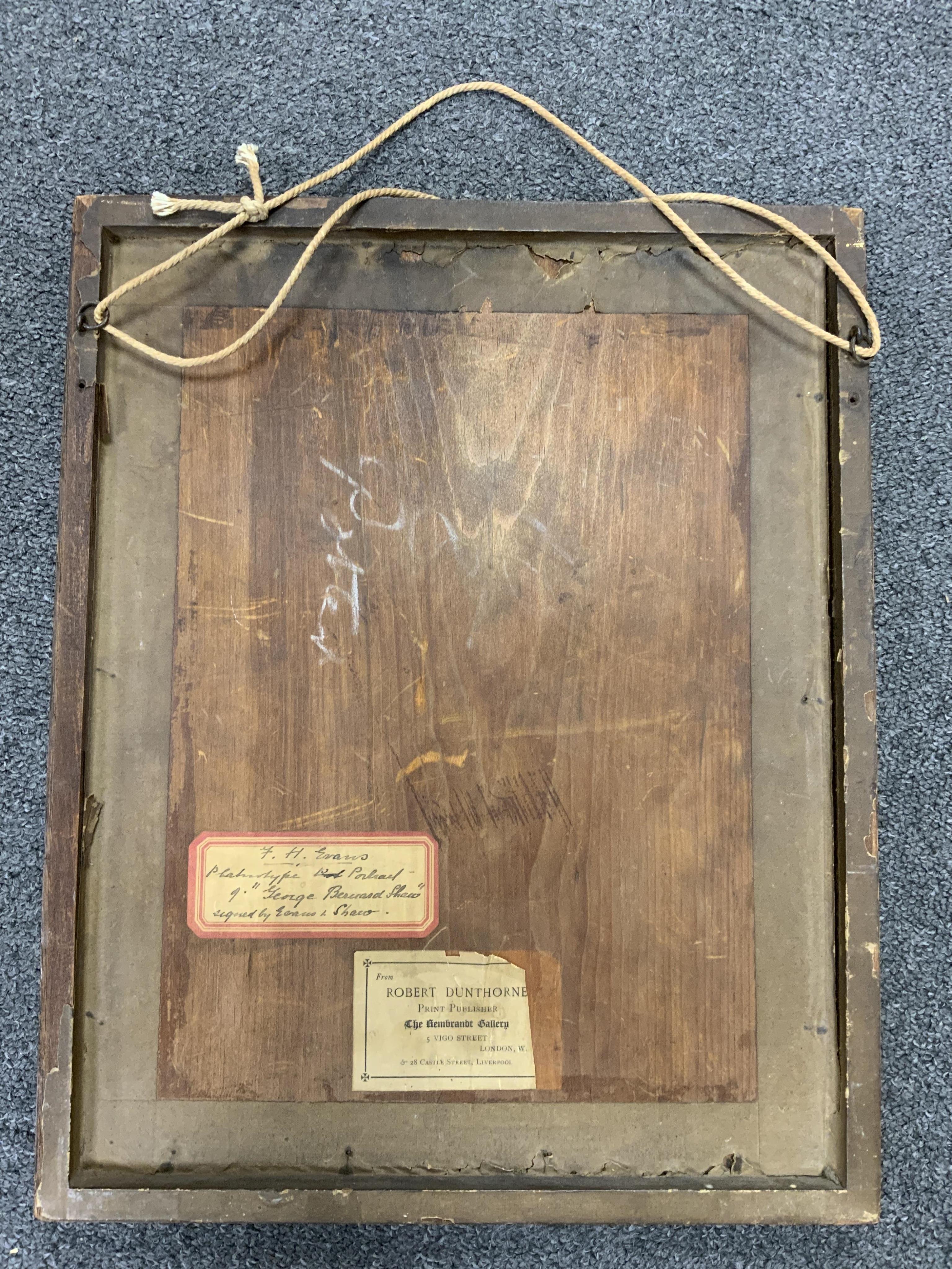 A signed photograph of George Bernard Shaw, also signed by the photographer Frederick H. Evans and dated 1901, in a contemporary oak frame 39 x 31cm, both signatures on the mount. Condition - good